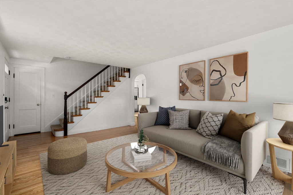 46 Bayard Street Dedham, MA 02026 - Photo 10 of 34 a living room with furniture and a wooden floor