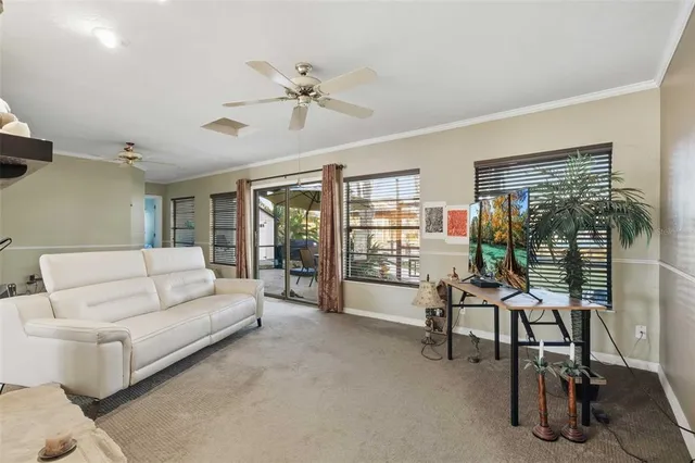 a view of a chairs and table in the patio