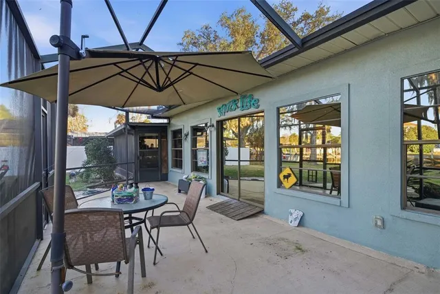 a view of walk in closet with clothes