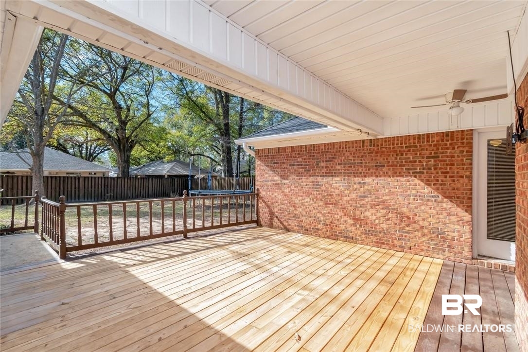 6601 Conde Court Mobile, AL 36695 - Photo 27 of 30 Wooden terrace with ceiling fan