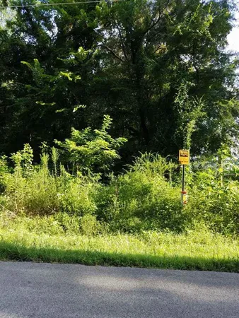 a backyard of a house with a yard