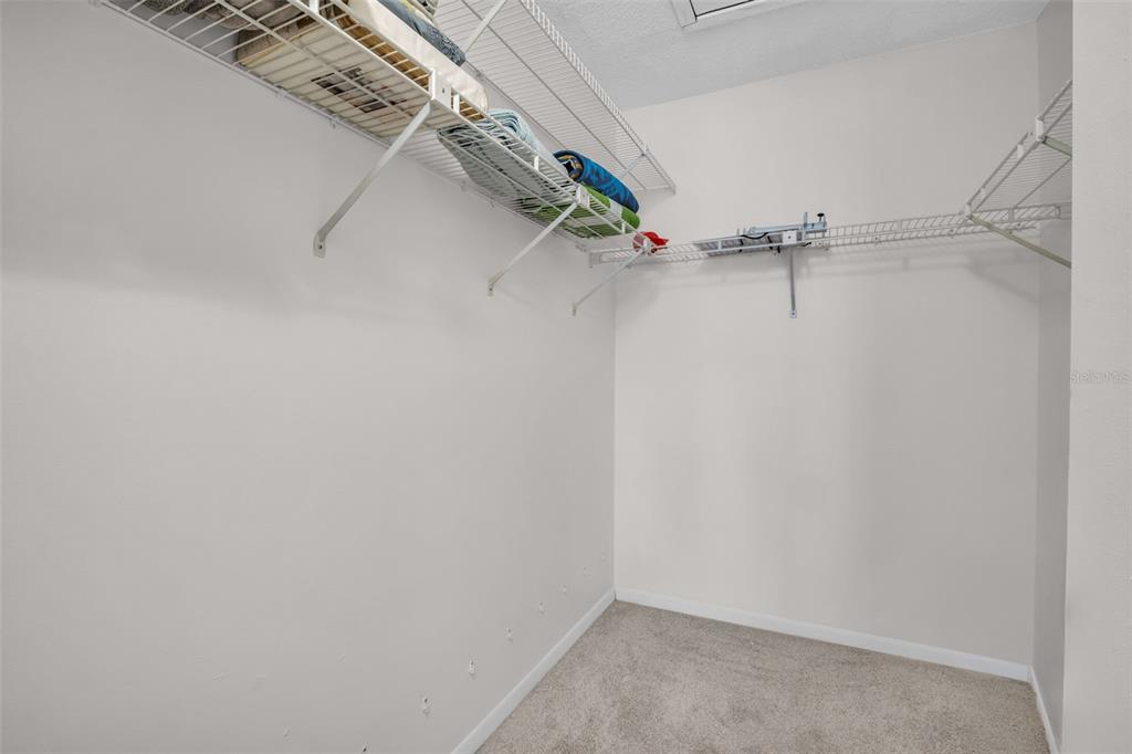 2523 Pine Ridge Way South, Unit C2 Palm Harbor, FL 34684 - Photo 20 of 29 a view of small space with racks on the wall