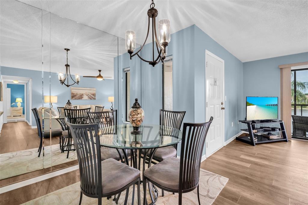 2523 Pine Ridge Way South, Unit C2 Palm Harbor, FL 34684 - Photo 9 of 29 a view of a dining room with furniture