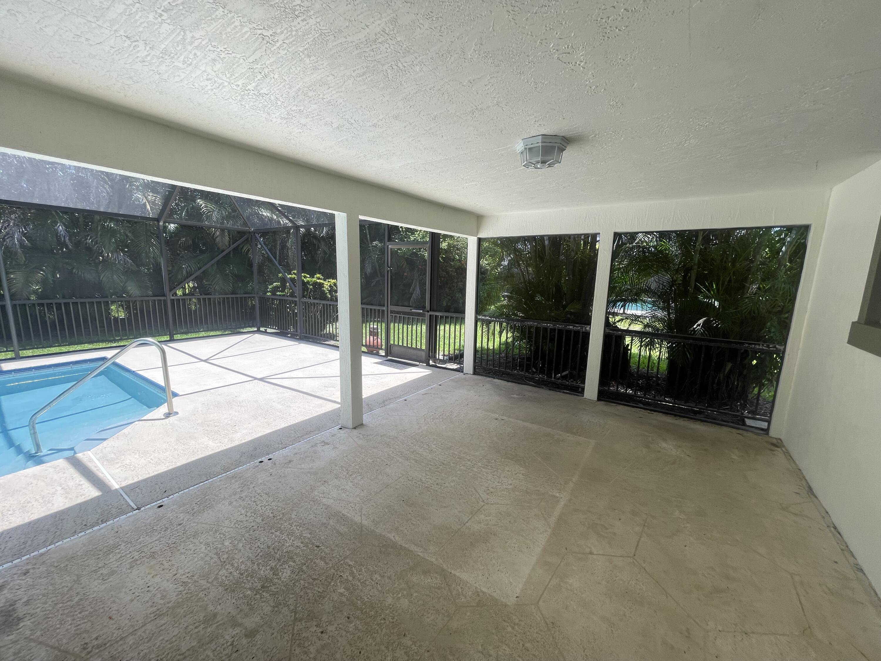 11737 Inverness Circle Wellington, FL 33414 - Photo 17 of 18 a view of a garden