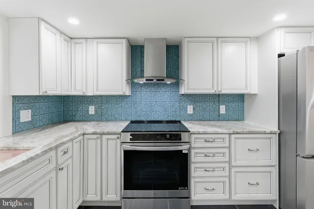 a view of hallway with wooden floor
