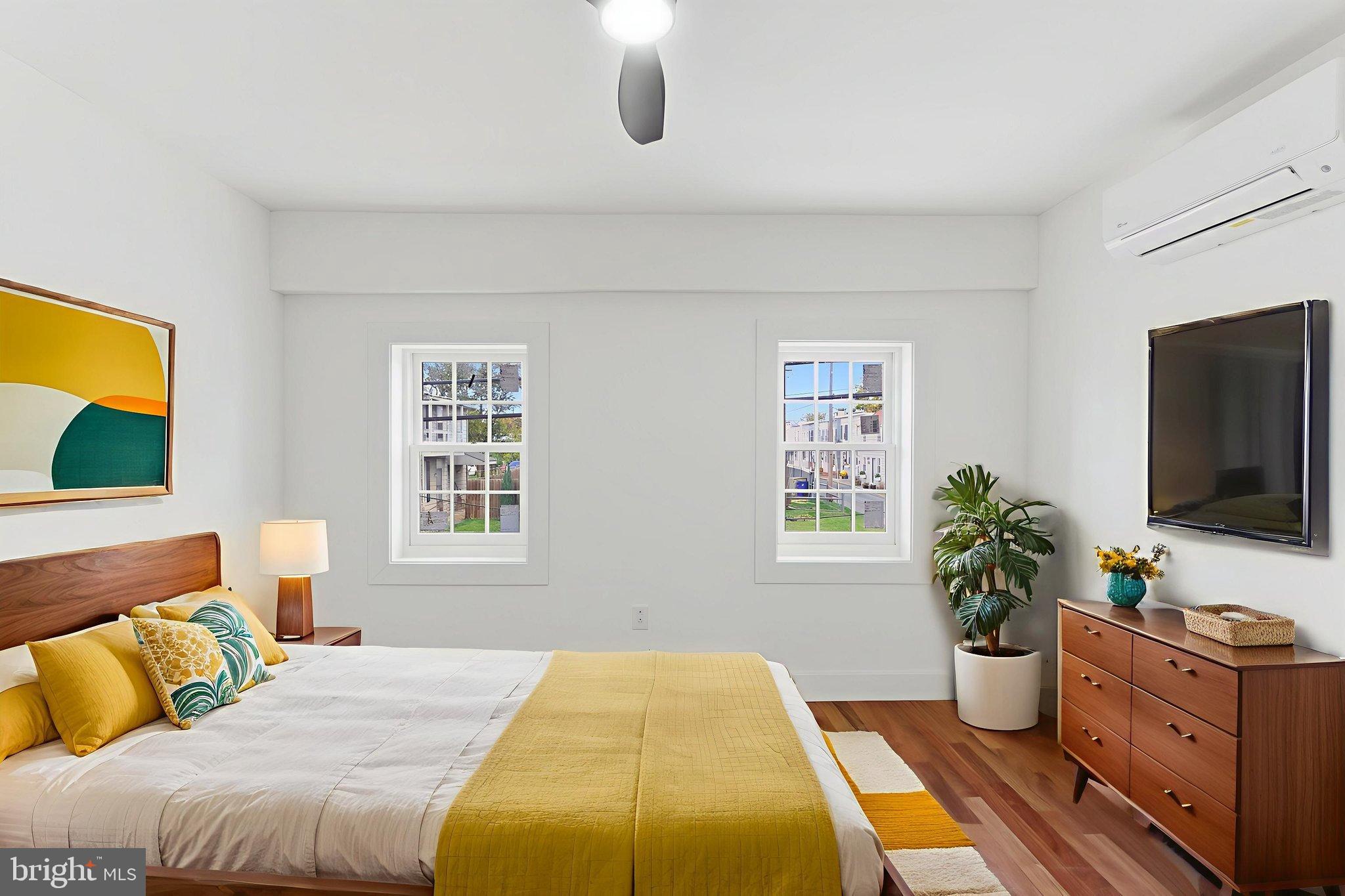 38 East 6th Street Frederick, MD 21701 - Photo 24 of 46 a bedroom with a bed potted plant with the window