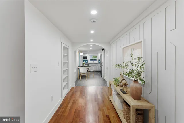 a view of gallery with wooden floor