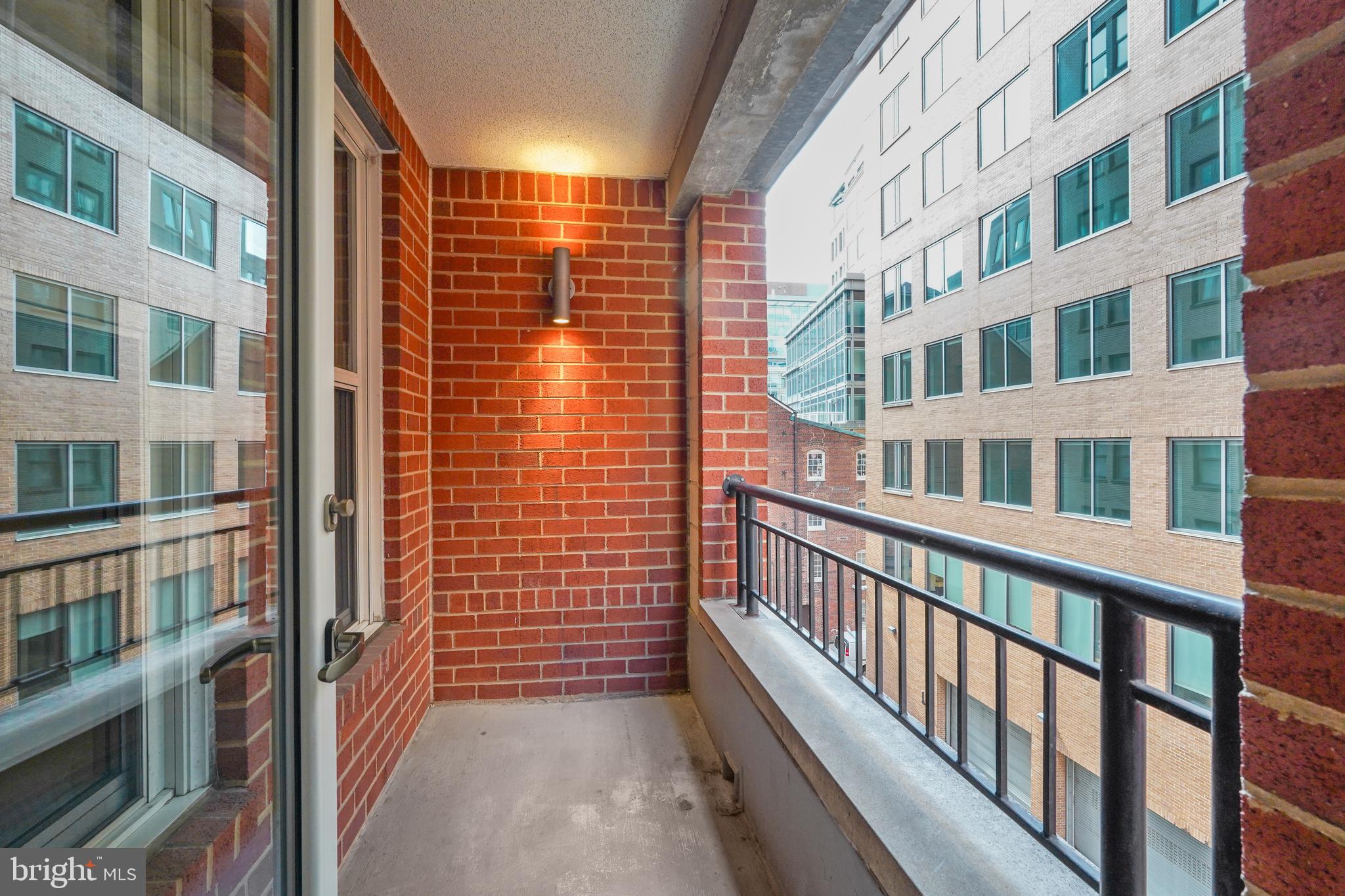 915 E Street Northwest, Unit 602 Washington, DC 20004 - Photo 16 of 23 a view of a building from a balcony