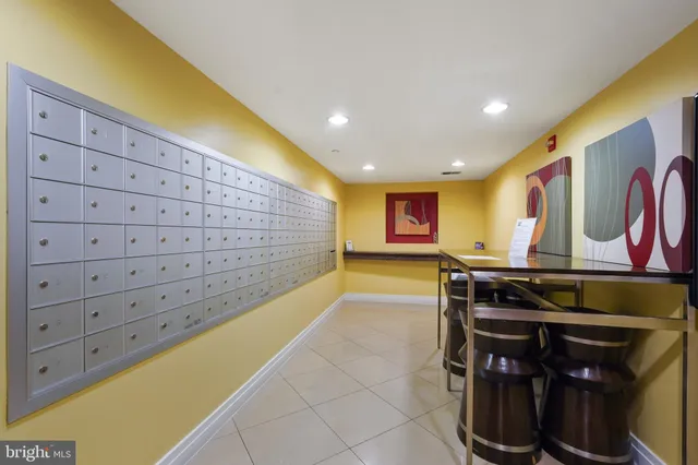 a view of an chairs and table in a room