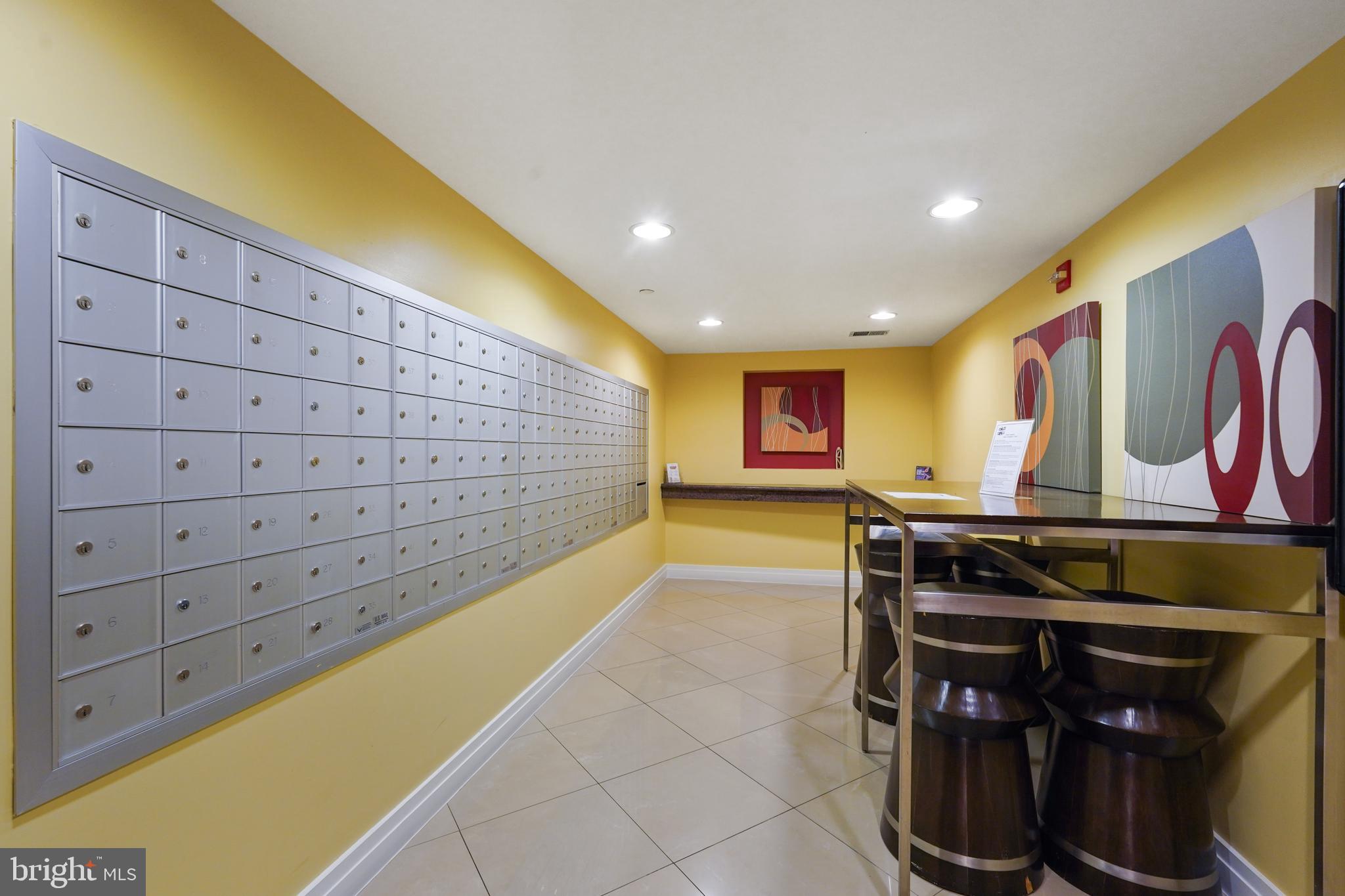 915 E Street Northwest, Unit 602 Washington, DC 20004 - Photo 4 of 23 a view of an chairs and table in a room