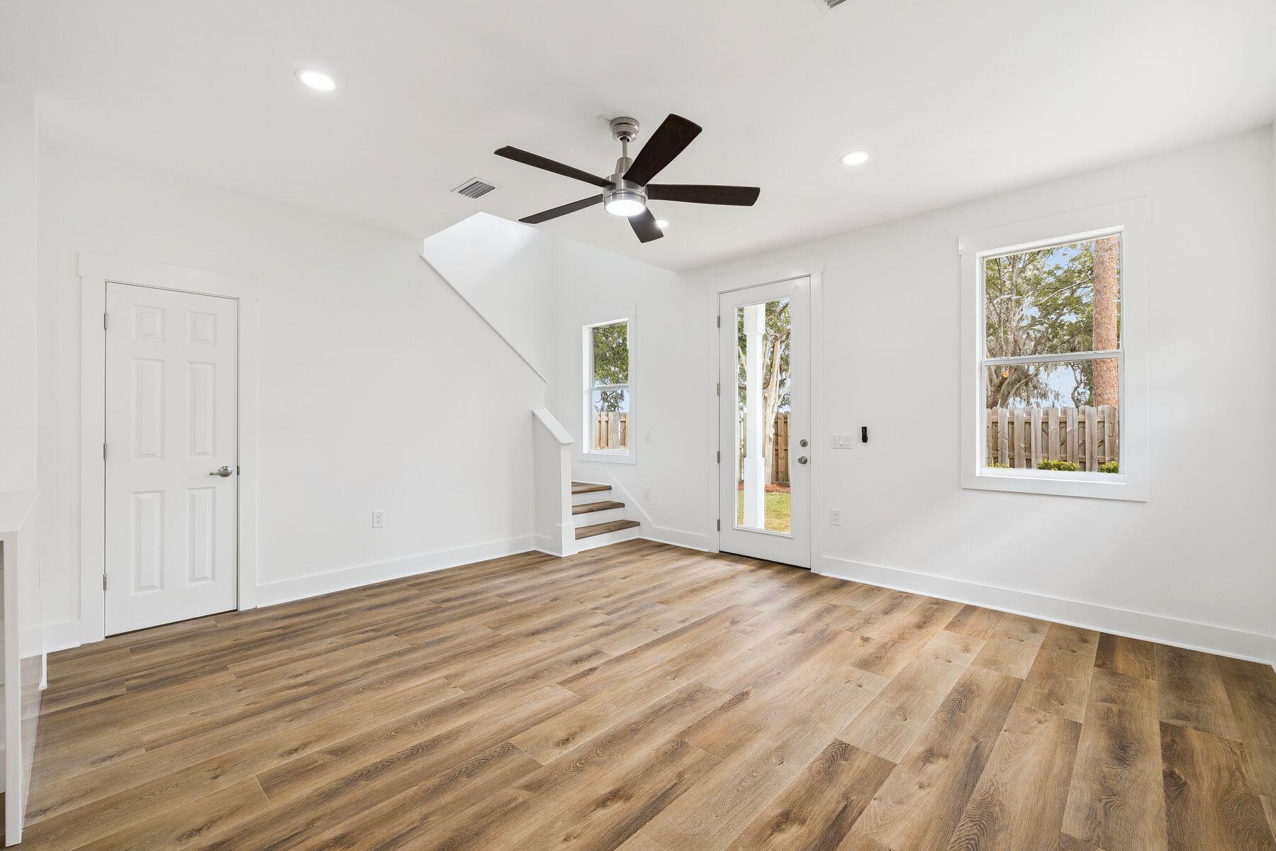 48 Pine Tree Way Santa Rosa Beach, FL 32459 - Photo 11 of 65 a view of empty room with wooden floor and fan