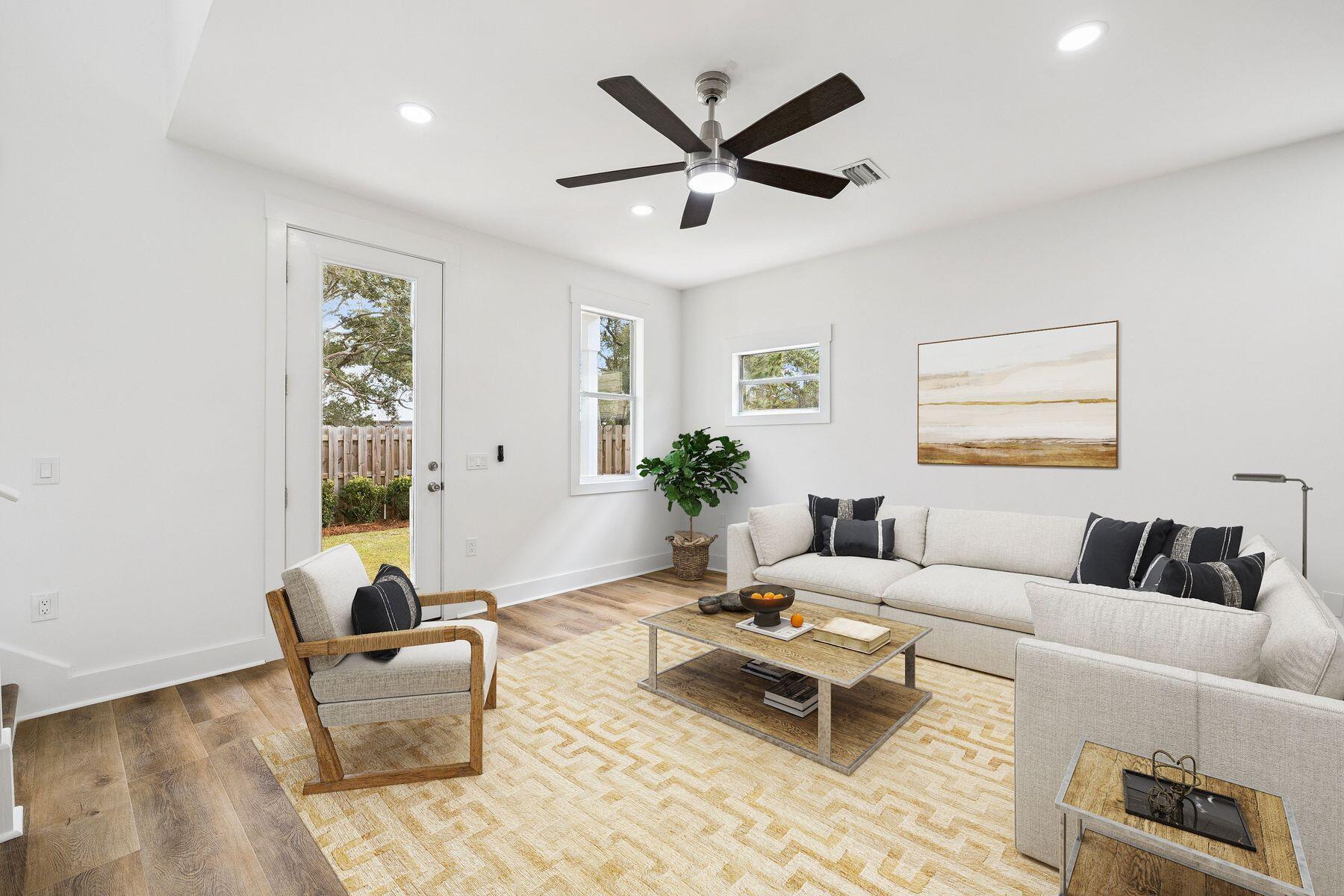 48 Pine Tree Way Santa Rosa Beach, FL 32459 - Photo 13 of 65 a living room with furniture and a large window