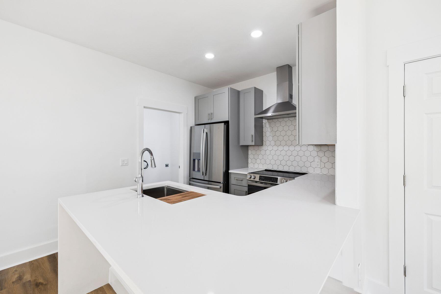 48 Pine Tree Way Santa Rosa Beach, FL 32459 - Photo 16 of 65 a kitchen with kitchen island a sink appliances and cabinets