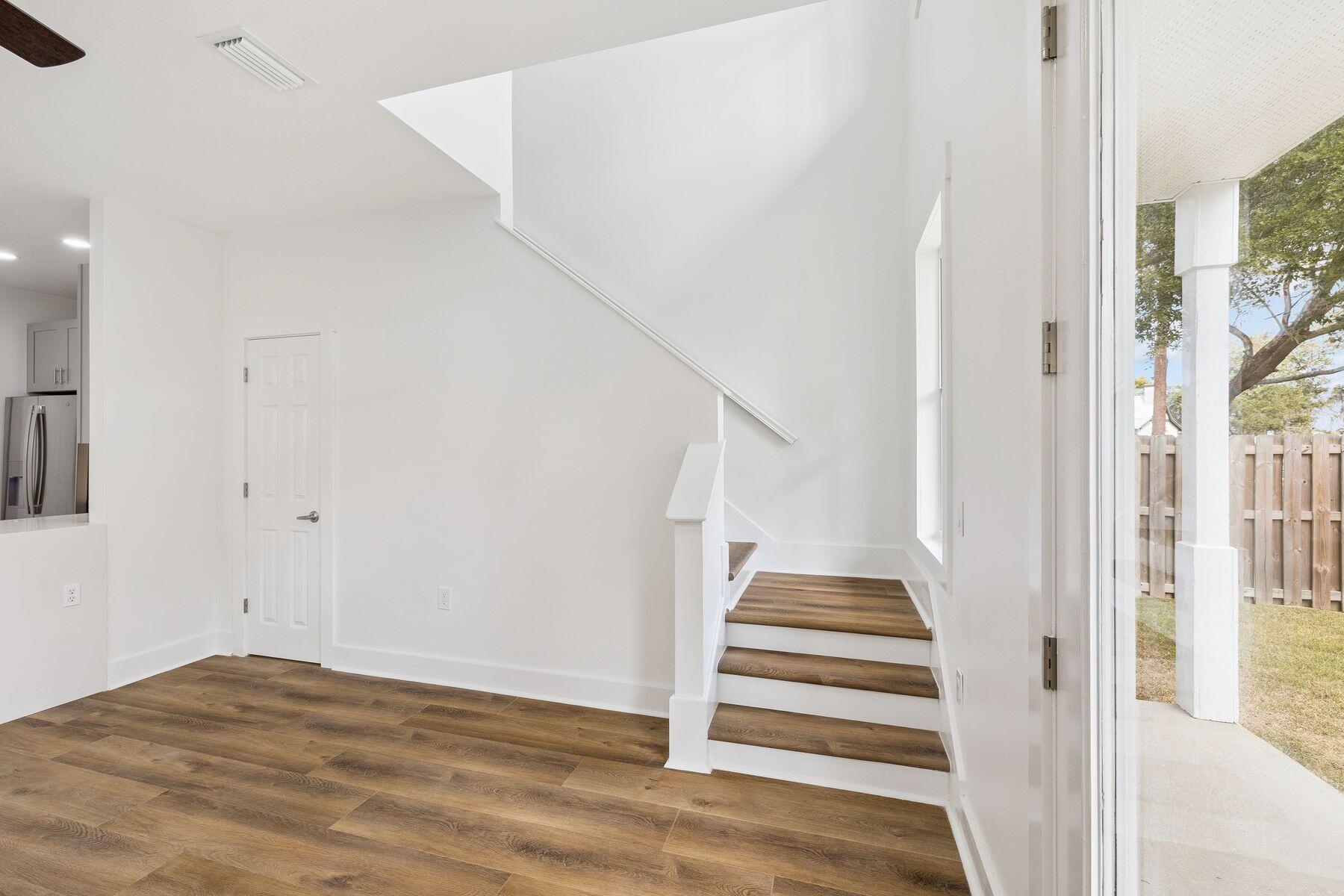 48 Pine Tree Way Santa Rosa Beach, FL 32459 - Photo 24 of 65 a view of entryway and hall with wooden floor