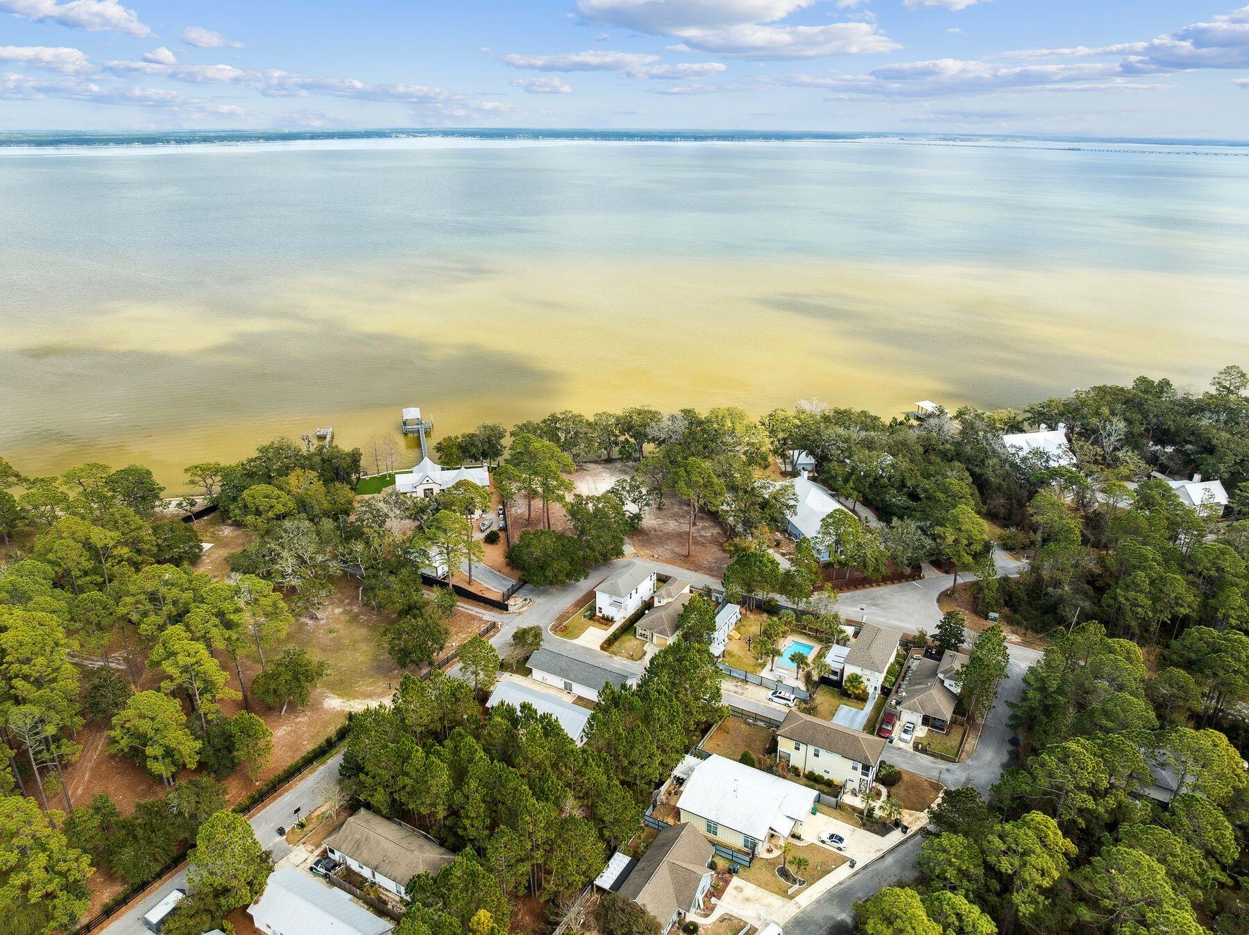 48 Pine Tree Way Santa Rosa Beach, FL 32459 - Photo 3 of 65 an aerial view of ocean and residential houses with outdoor space