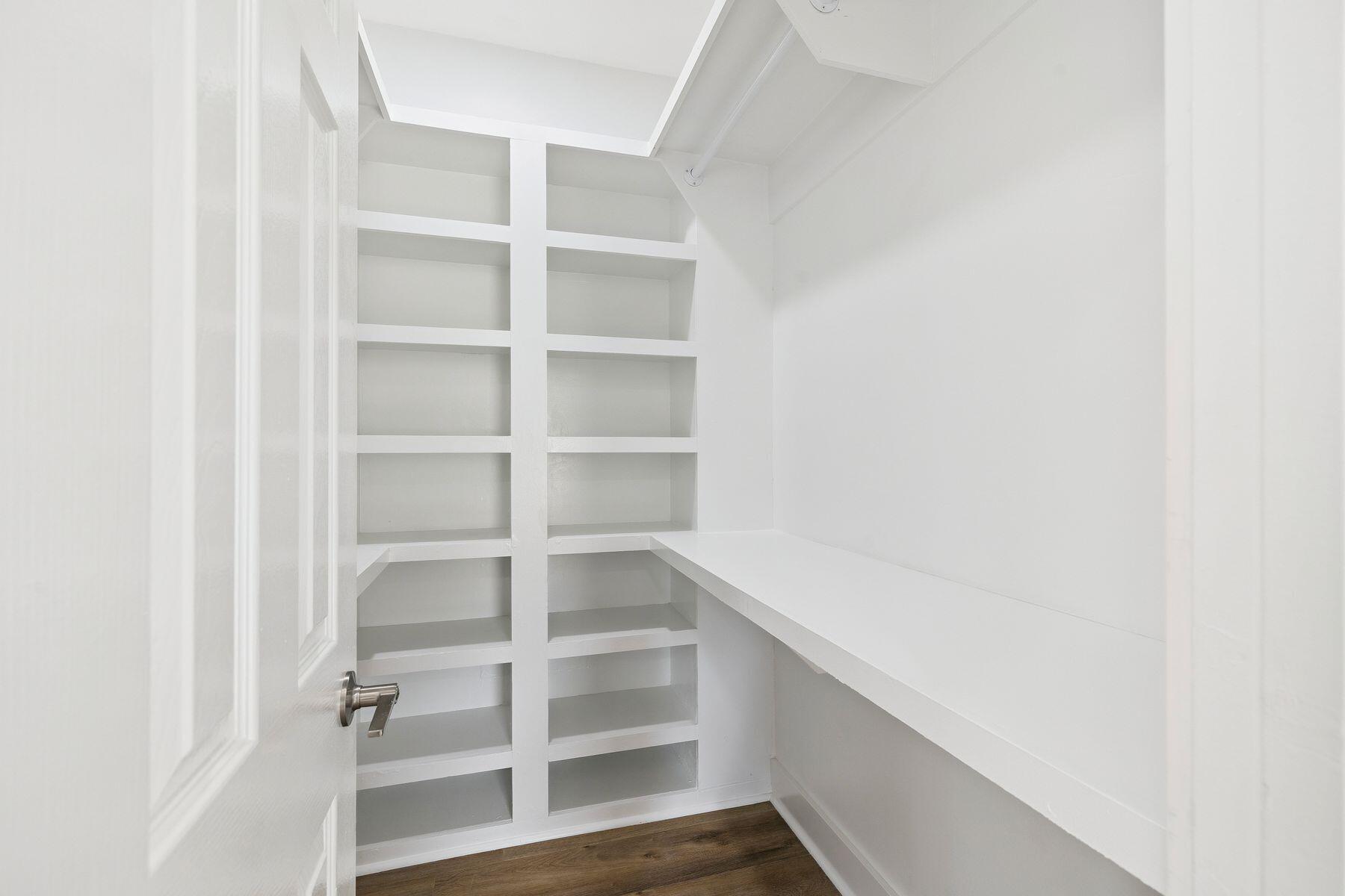 48 Pine Tree Way Santa Rosa Beach, FL 32459 - Photo 35 of 65 a view of walk in closet with empty racks