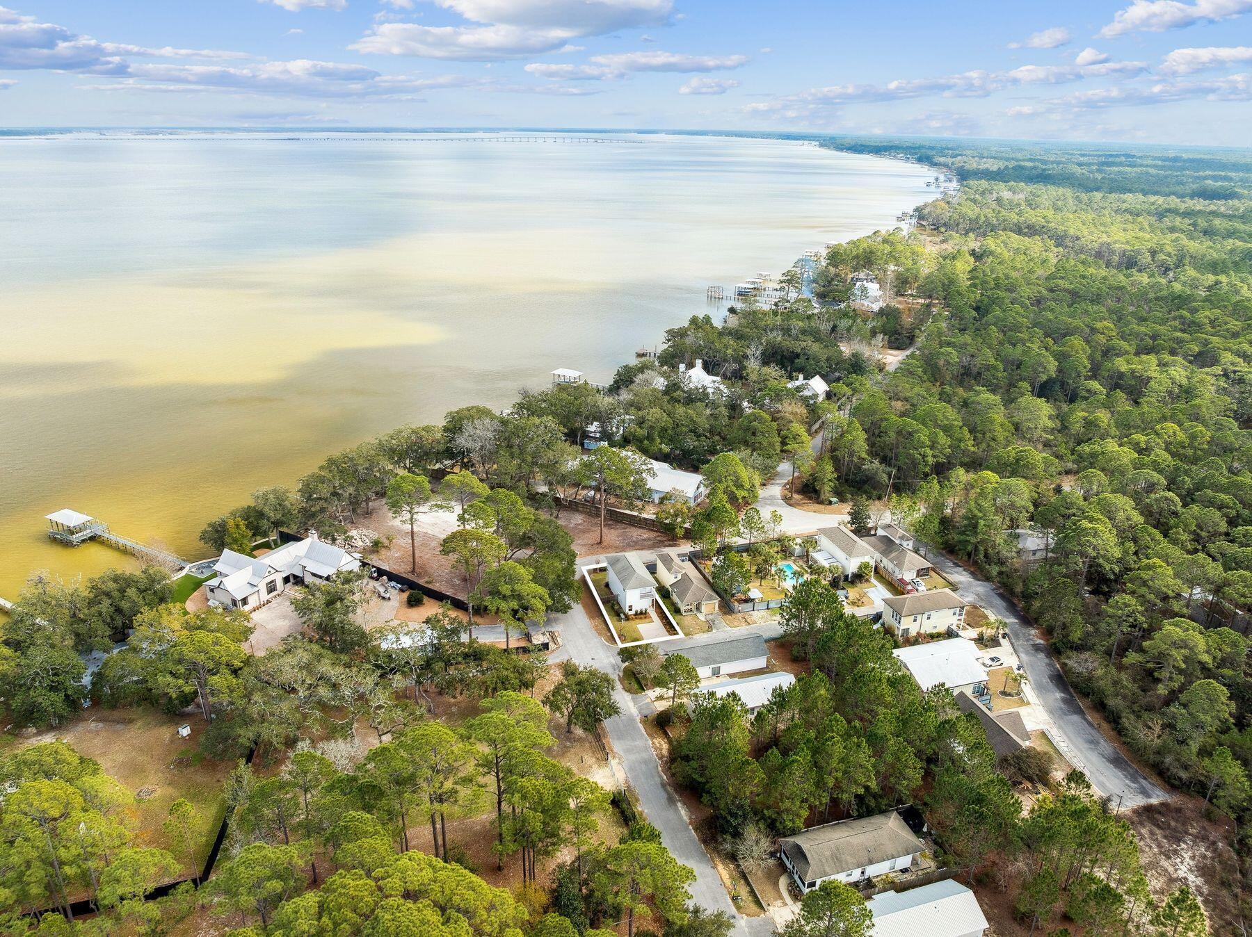 48 Pine Tree Way Santa Rosa Beach, FL 32459 - Photo 48 of 65 a view of a lake with an ocean