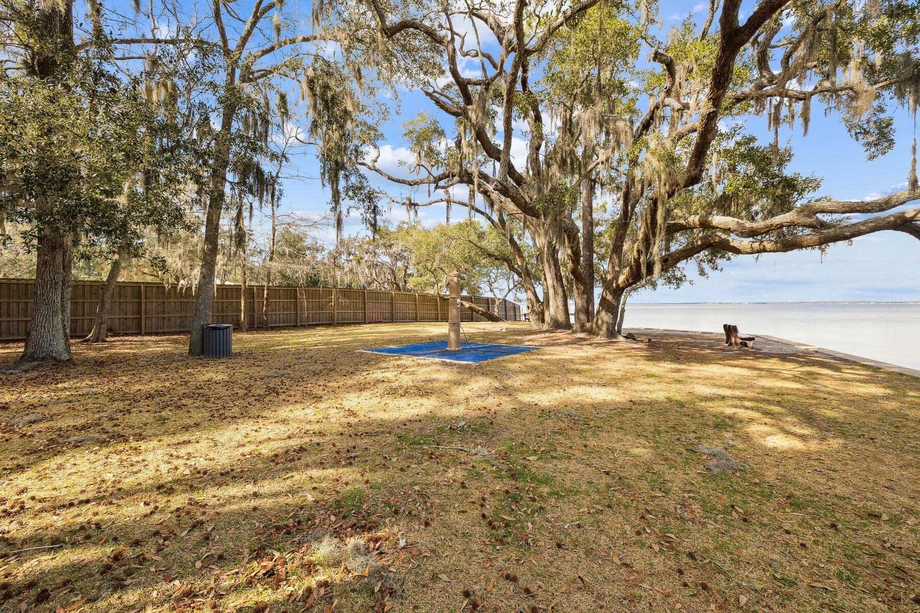 48 Pine Tree Way Santa Rosa Beach, FL 32459 - Photo 52 of 65 a view of yard covered with snow
