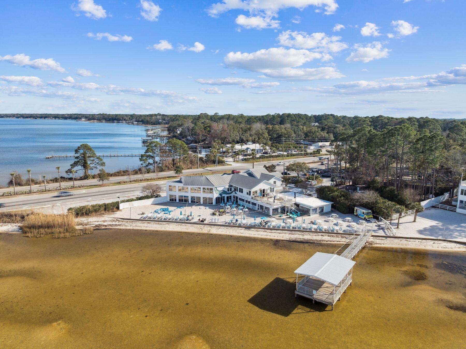 48 Pine Tree Way Santa Rosa Beach, FL 32459 - Photo 56 of 65 a view of a lake with houses