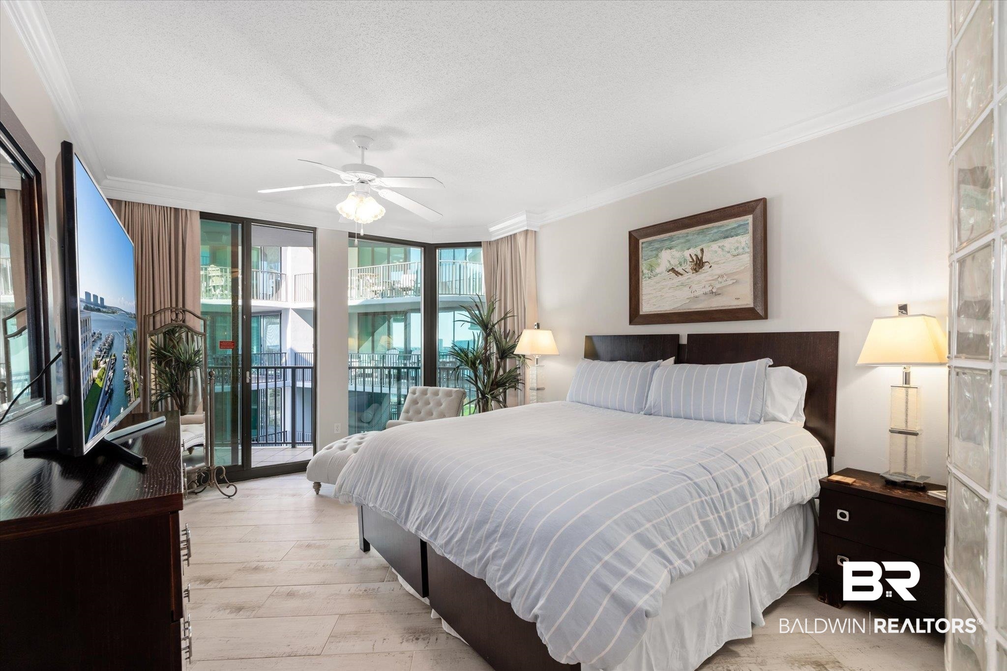 27582 Canal Road, Unit 2611 Orange Beach, AL 36561 - Photo 14 of 37 Bedroom featuring floor to ceiling windows, access to exterior, a textured ceiling, crown molding, and ceiling fan