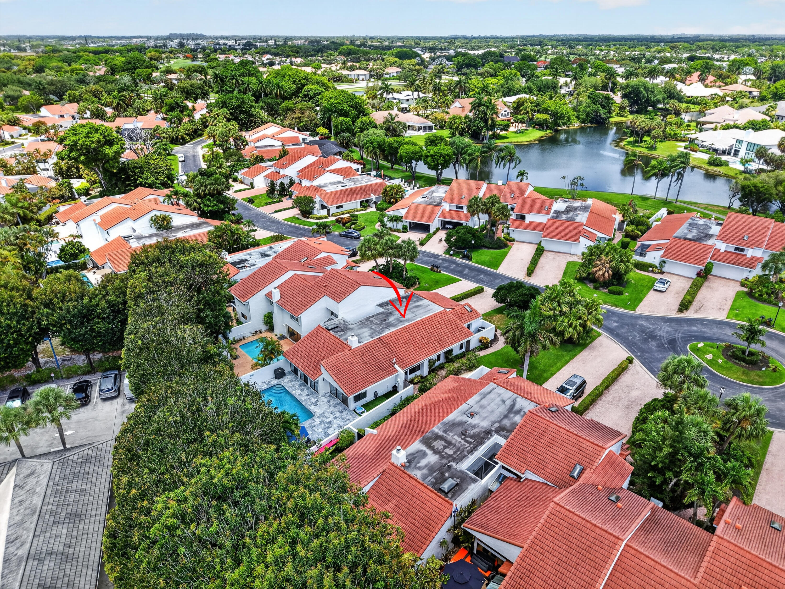 7374 Woodmont Court Boca Raton, FL 33434 - Photo 51 of 95 an aerial view of residential house with outdoor space and lake view