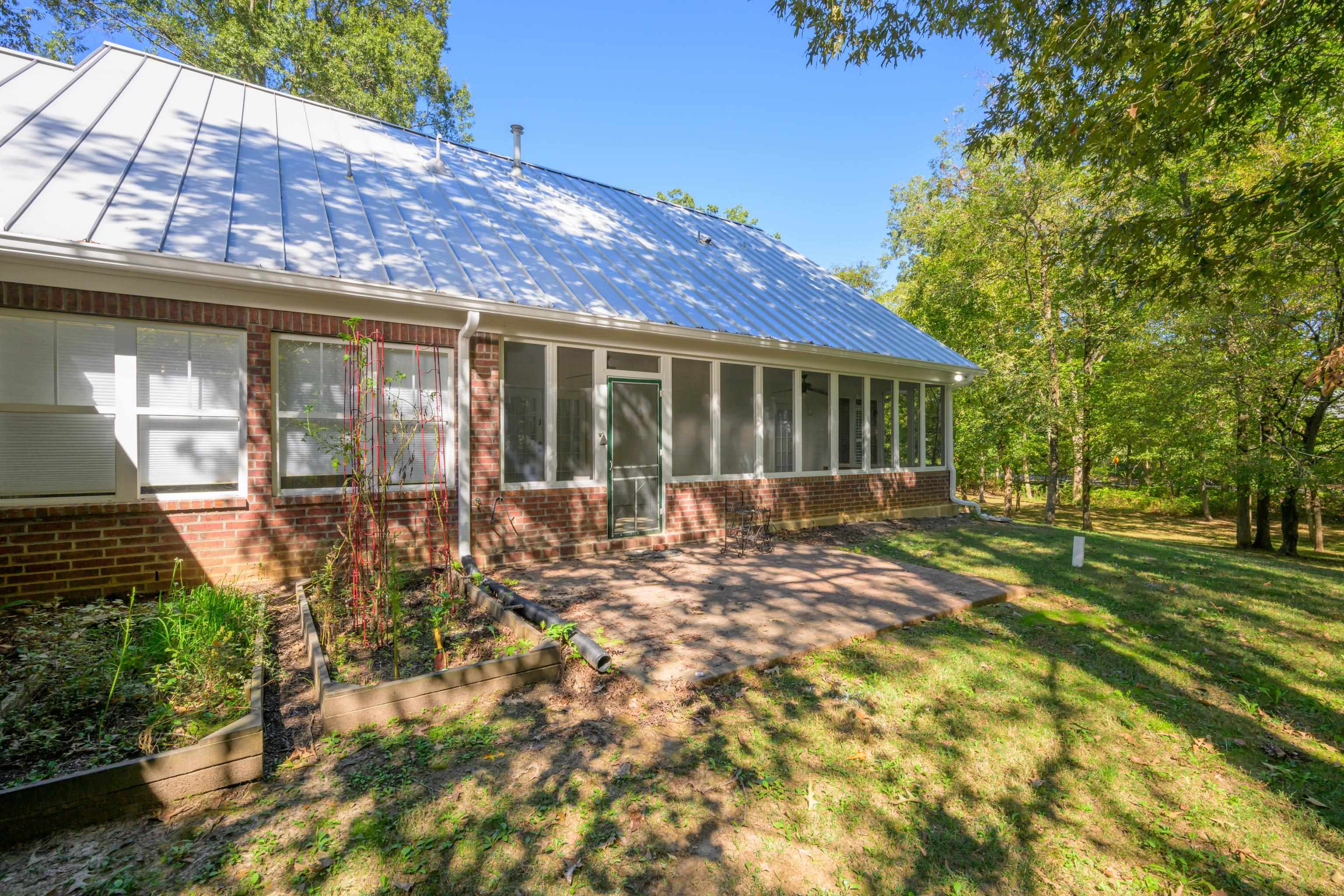 9575 Pleasant Ridge Road Lakeland, TN 38002 - Photo 31 of 40 a view of house with backyard