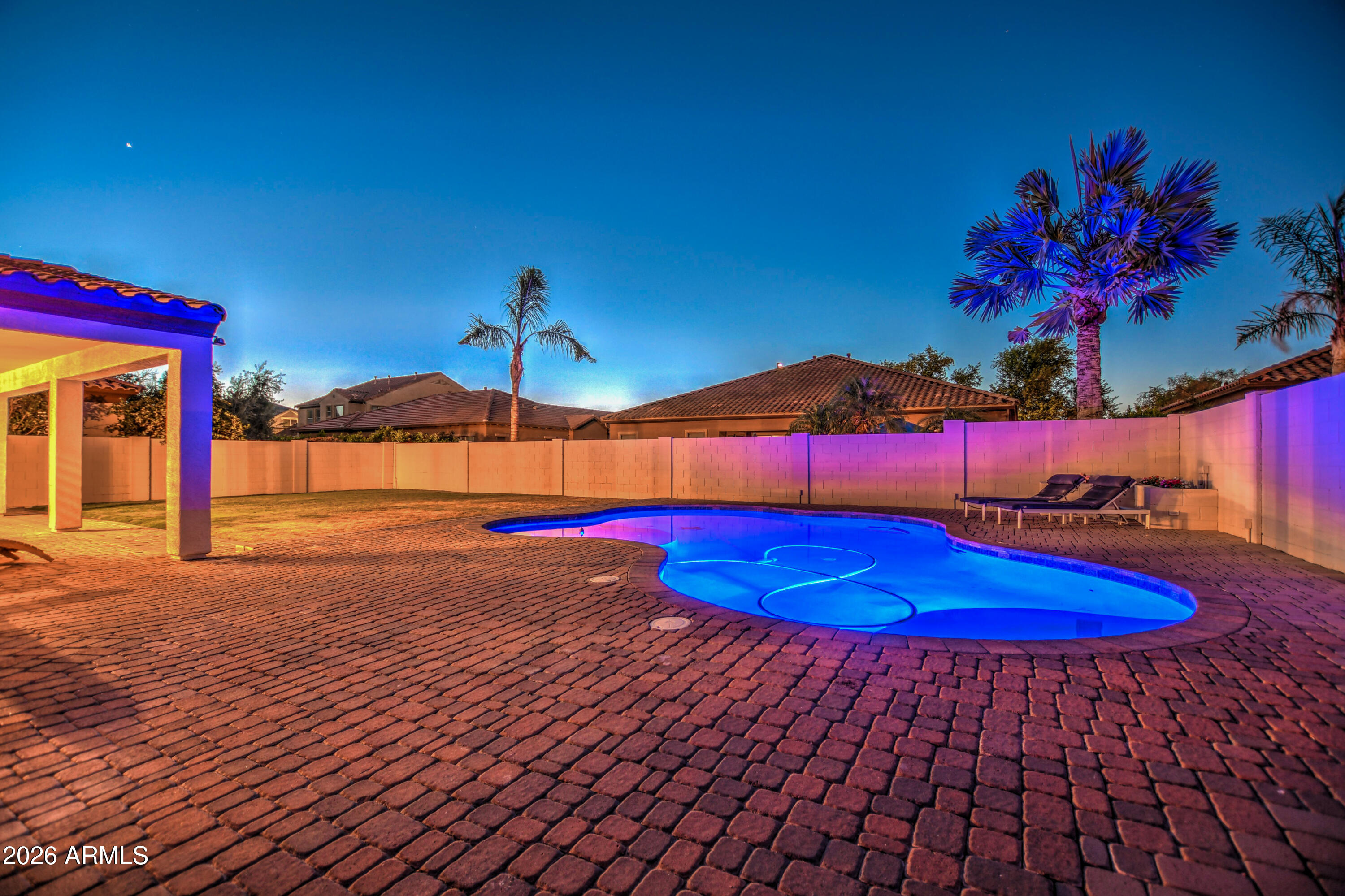 3078 East Muirfield Street Gilbert, AZ 85298 - Photo 90 of 92 a view of swimming pool with seating space