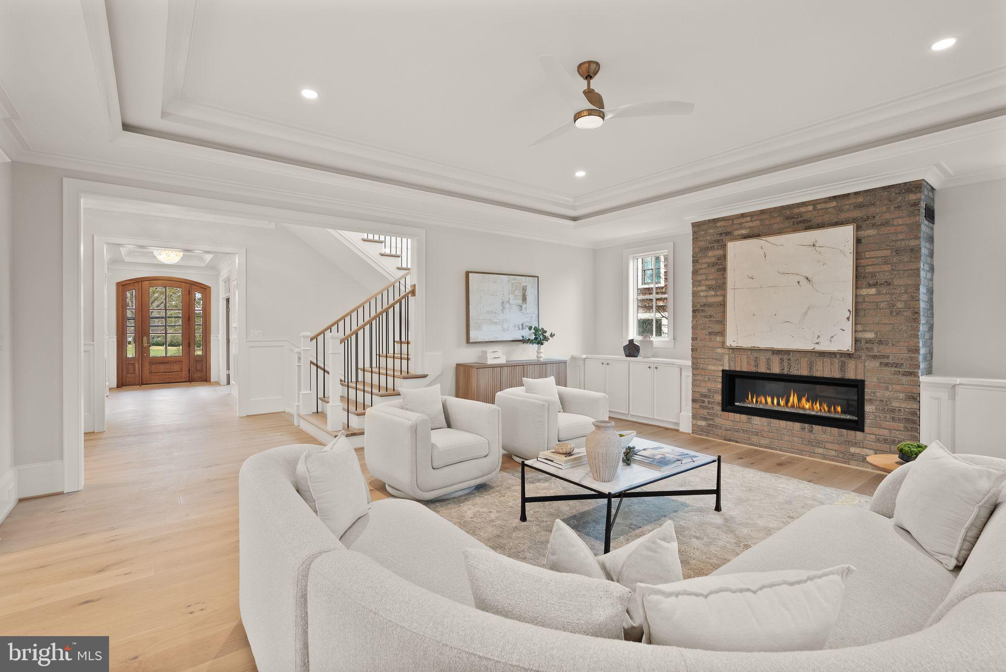 3941 North Glebe Road Arlington, VA 22207 - Photo 19 of 76 Family room with gas fireplace. Brick surround