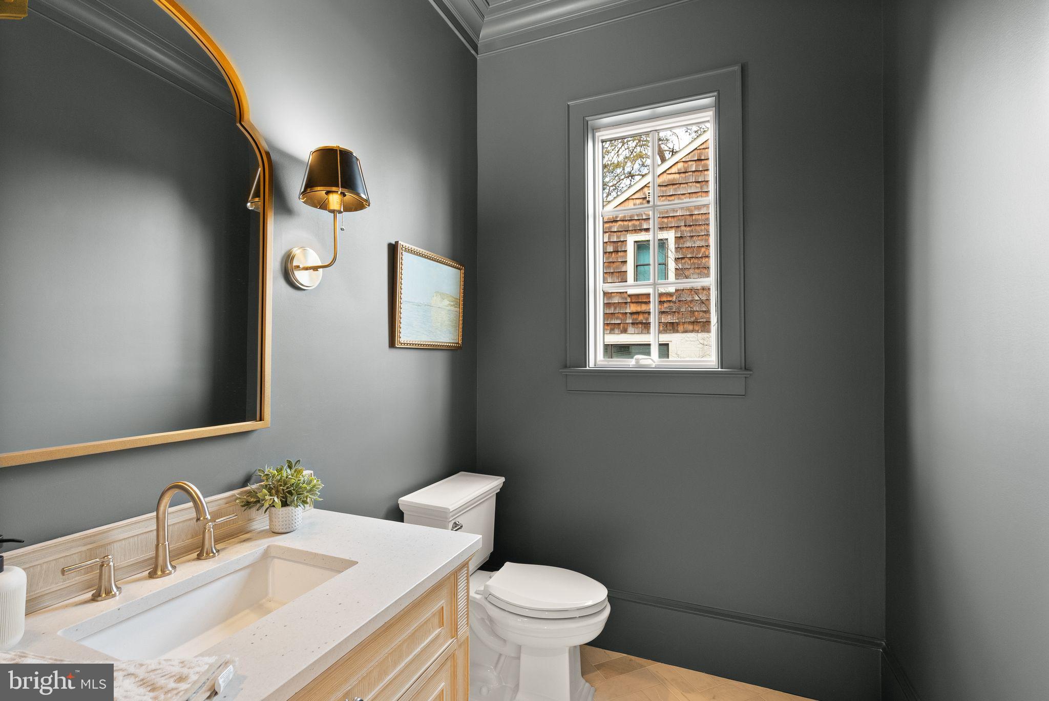 3941 North Glebe Road Arlington, VA 22207 - Photo 33 of 76 Powder room. Marble herringbone floor.