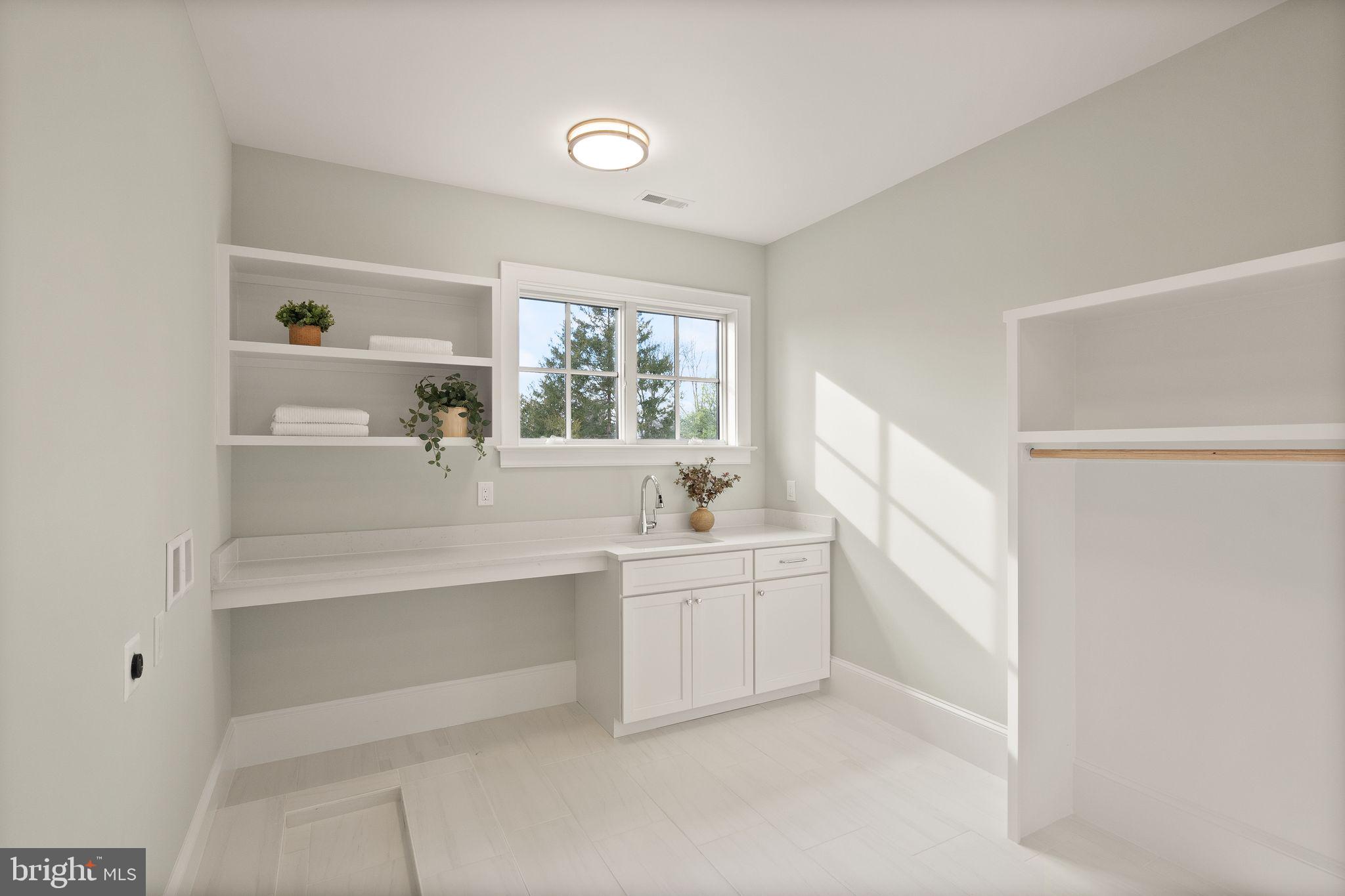 3941 North Glebe Road Arlington, VA 22207 - Photo 57 of 76 Upper floor laundry. Built-ins. Hanging rod.