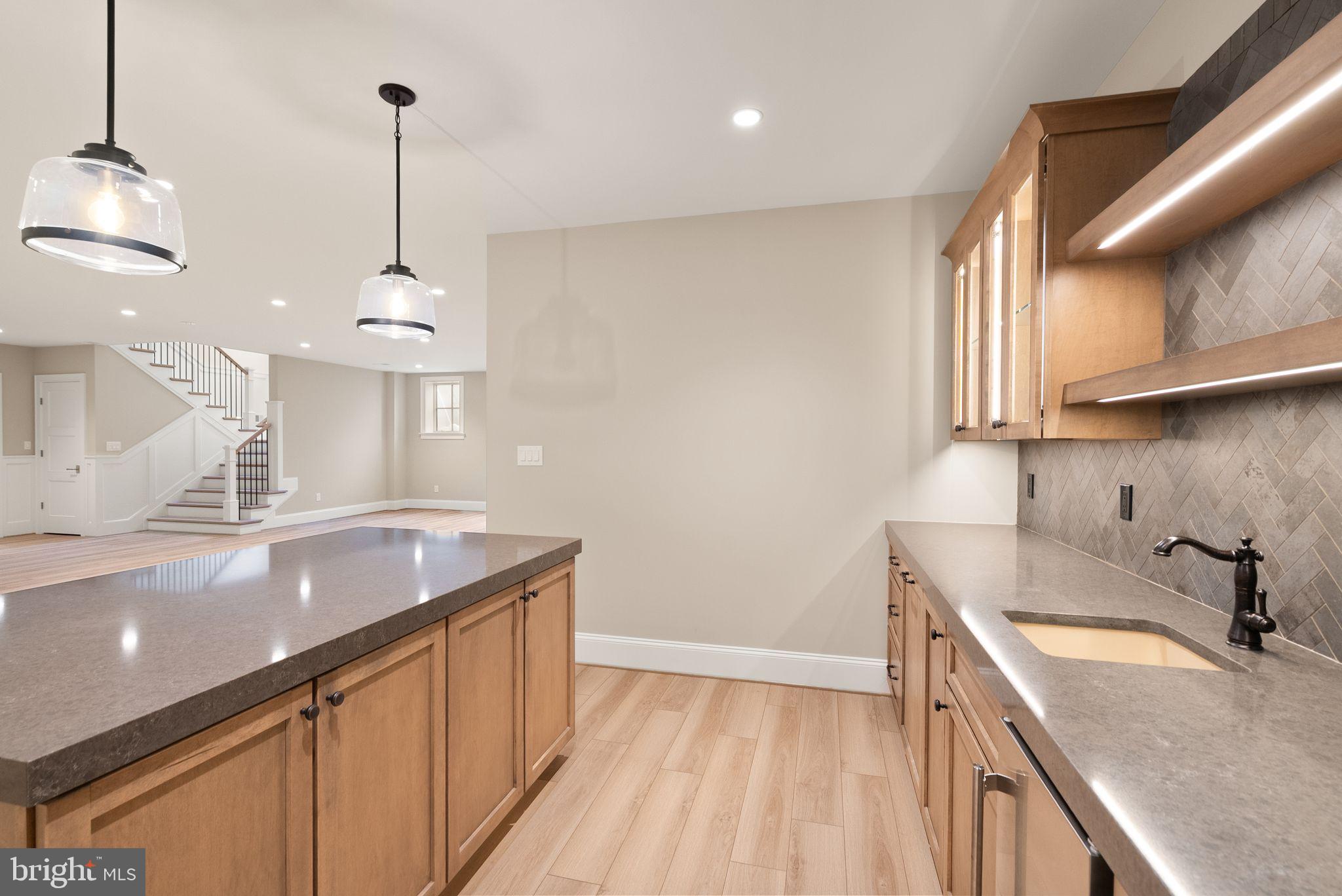 3941 North Glebe Road Arlington, VA 22207 - Photo 62 of 76 Wet bar w/large island. 2.5" quartz.