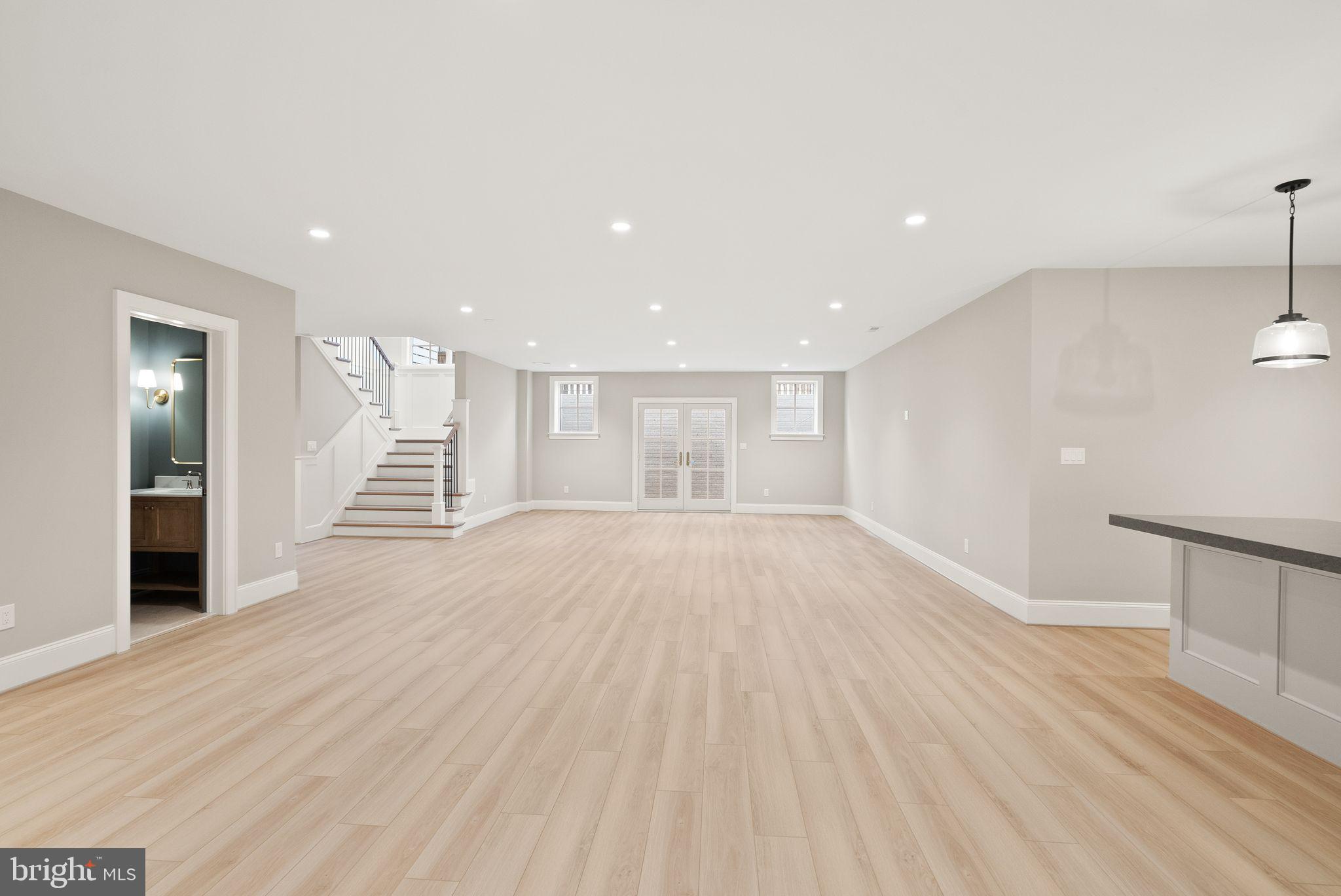 3941 North Glebe Road Arlington, VA 22207 - Photo 63 of 76 Rec room w/powder room & french doors to back yard