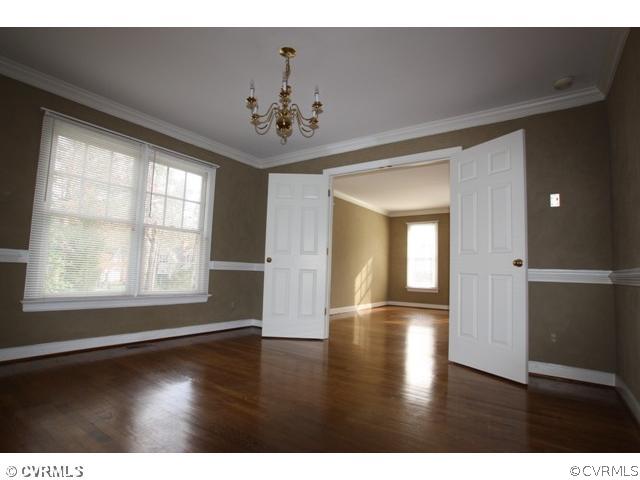 13910 Shadow Ridge Road Midlothian, VA 23112 - Photo 2 of 7 a view of empty room with wooden floor and fan
