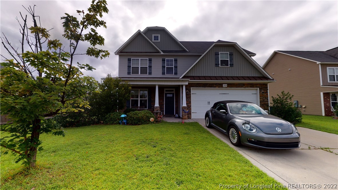 3428 Park Hill Road Fayetteville, NC 28311 - Photo 1 of 29 a front view of a house with garden
