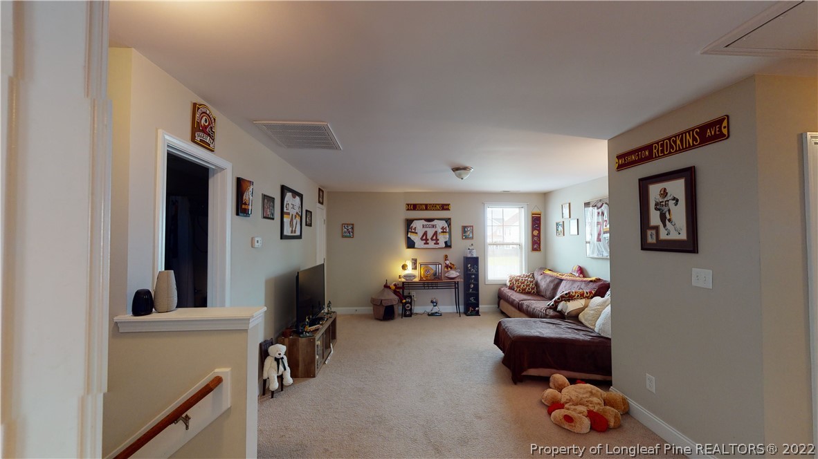 3428 Park Hill Road Fayetteville, NC 28311 - Photo 19 of 29 a living room with furniture and a window