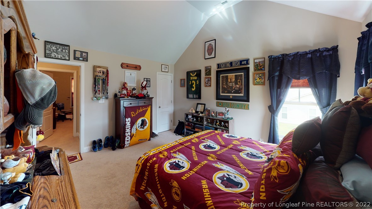 3428 Park Hill Road Fayetteville, NC 28311 - Photo 25 of 29 a bedroom with bed and wooden floor