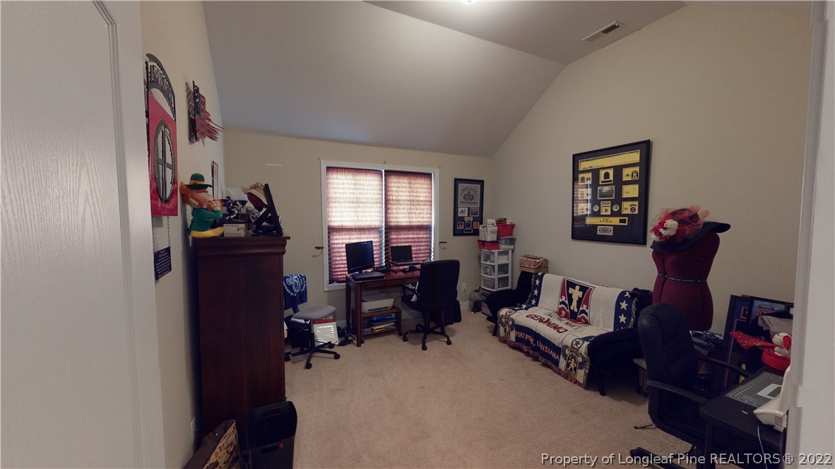 3428 Park Hill Road Fayetteville, NC 28311 - Photo 26 of 29 a living room with furniture and a window