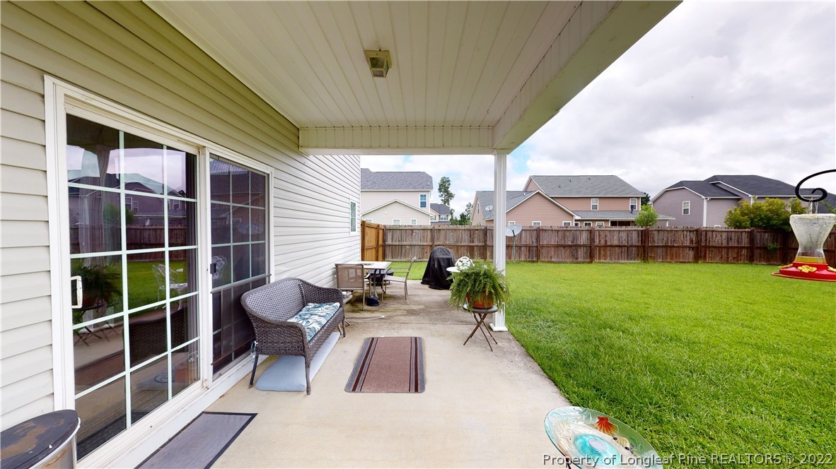 3428 Park Hill Road Fayetteville, NC 28311 - Photo 29 of 29 a view of a house with backyard and porch