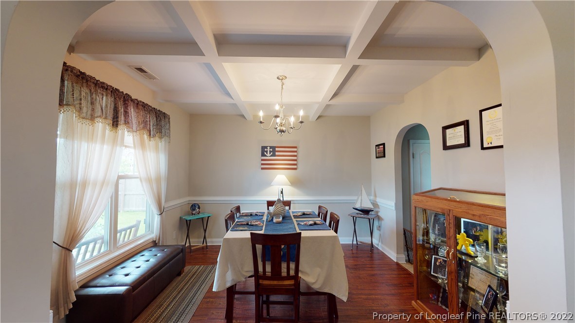 3428 Park Hill Road Fayetteville, NC 28311 - Photo 3 of 29 a view of a dining room with furniture window and wooden floor