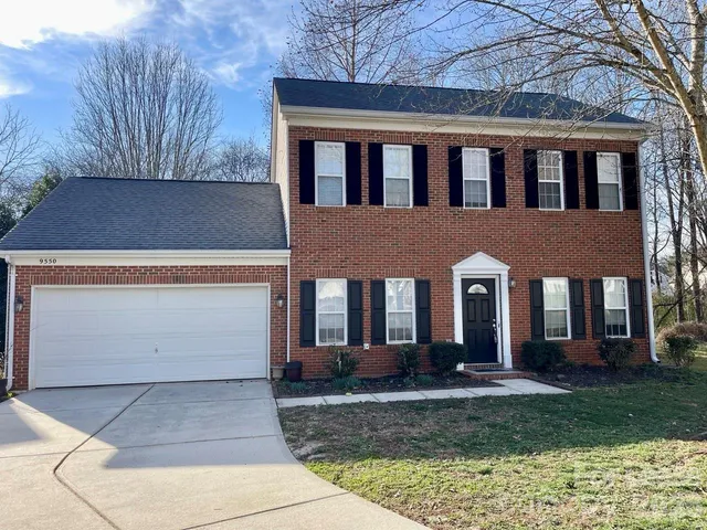 a front view of house with yard