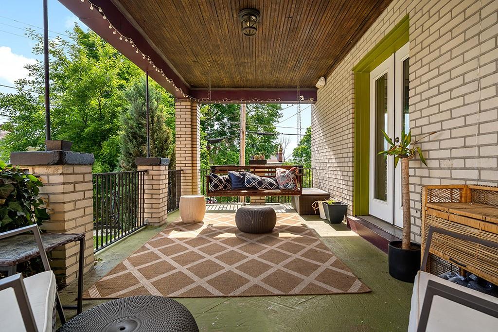 200 Richbarn Road Pittsburgh, PA 15212 - Photo 12 of 14 a building outdoor space with patio furniture and potted plants