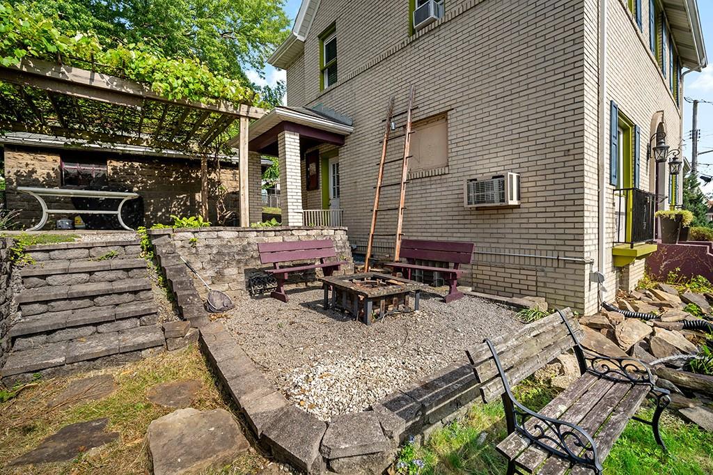 200 Richbarn Road Pittsburgh, PA 15212 - Photo 13 of 14 a view of a patio with table and chairs and potted plants