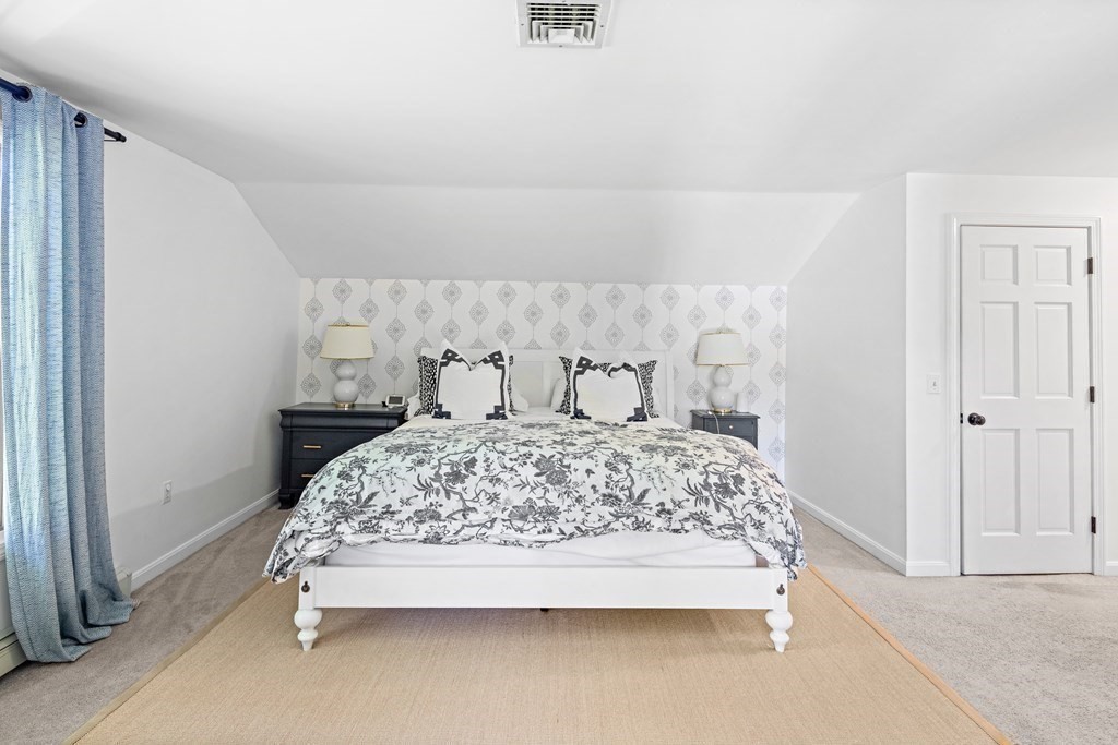 11 Lawson Road Scituate, MA 02066 - Photo 23 of 33 a room with a bed and a table