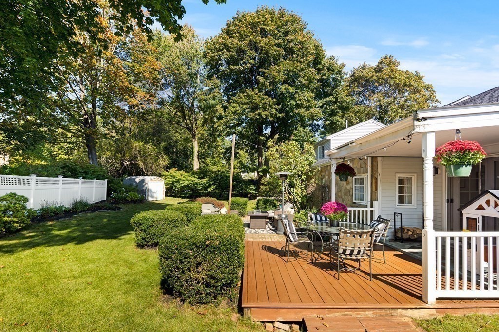 11 Lawson Road Scituate, MA 02066 - Photo 30 of 33 a view of house with patio outdoor seating and covered with trees