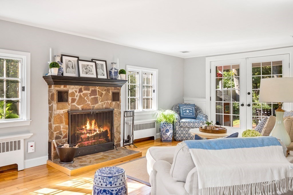 11 Lawson Road Scituate, MA 02066 - Photo 10 of 33 a living room with furniture a window and a fireplace