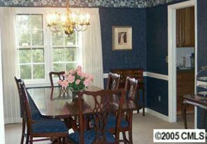 6639 Sharon Road Charlotte, NC 28210 - Photo 4 of 8 a view of a dining room with furniture and window