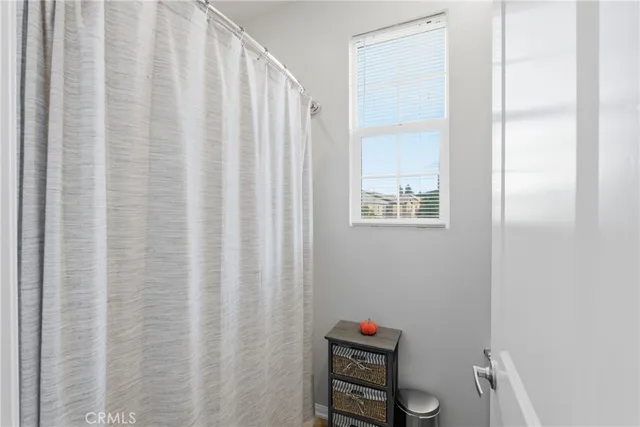 a bedroom with a bed and a cabinets