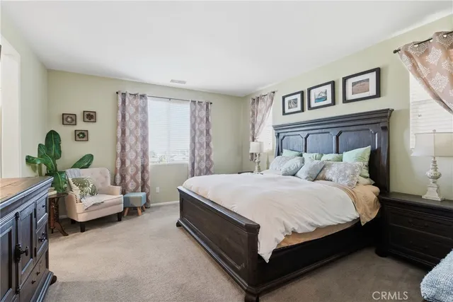 a bathroom with a sink double vanity and a shower