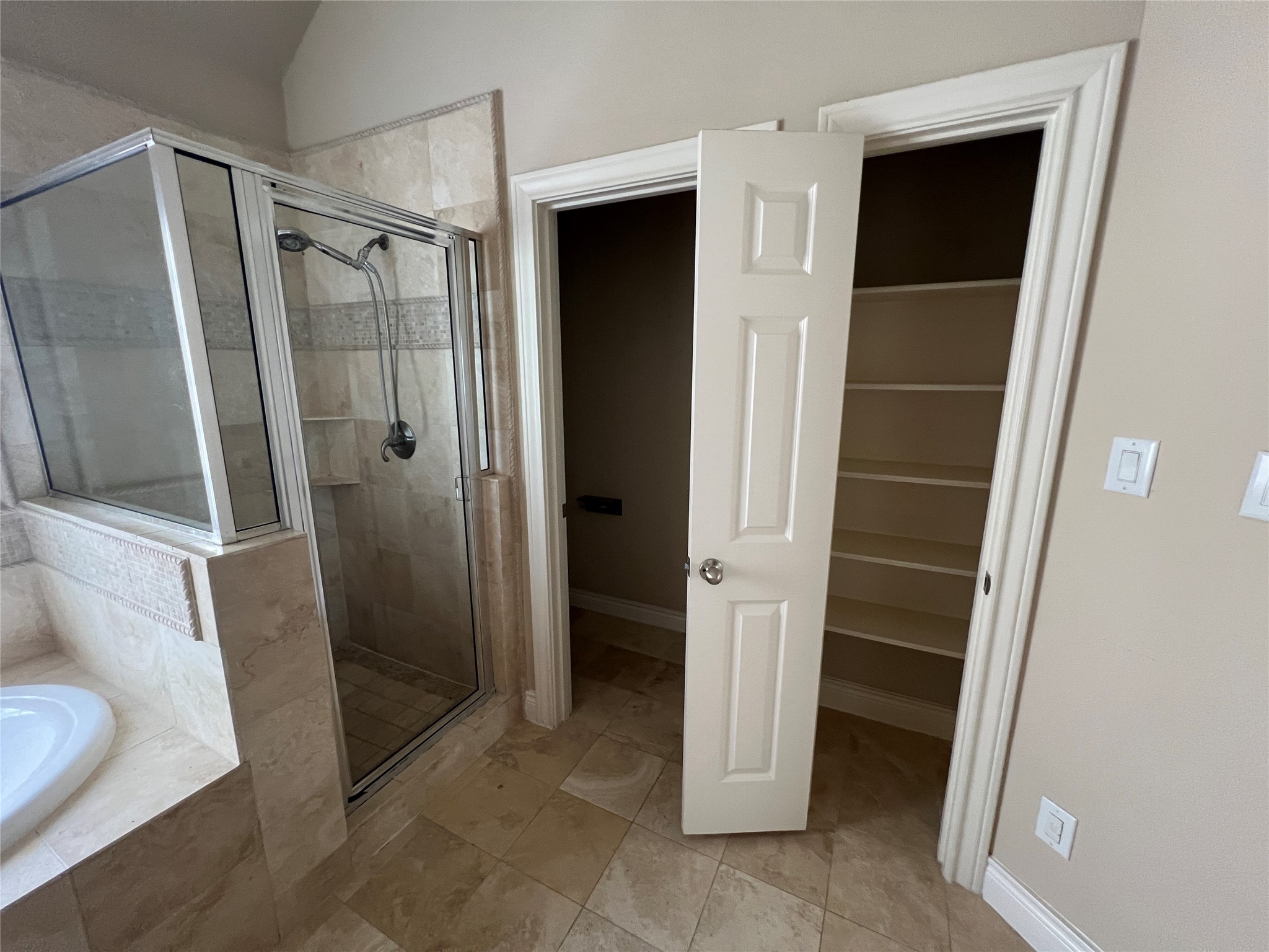 5940 Kansas Street Houston, TX 77007 - Photo 25 of 29 a bathroom with a shower and a sink