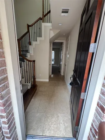 a view of an entryway with staircase